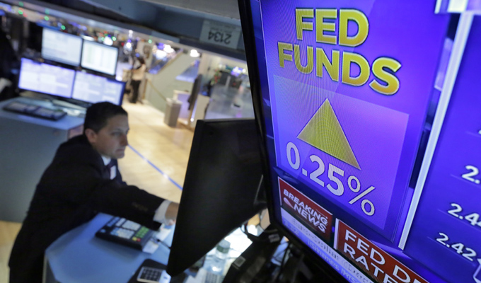 美聯儲折騰一年終加息 多項懸念仍待解