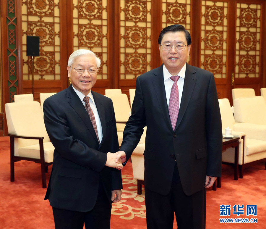 1月13日,中共中央政治局常委、全國人大常委會委員長張德江在北京人民大會堂會見越共中央總書記阮富仲。 新華社記者 劉衛兵 攝 1月13日,中共中央政治局常委、全國人大常委會委員長張德江在北京人民大會堂會見越共中央總書記阮富仲。 新華社記者 劉衛兵 攝