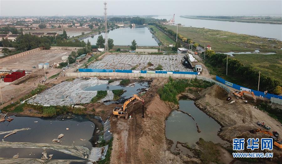 （新華視點(diǎn)&middot;圖文互動(dòng)）（2）中央督察兩年有的絲毫未改，有的不減反增&mdash;&mdash;江蘇泰興數(shù)萬噸化工廢料和污泥堆放長江邊調(diào)查