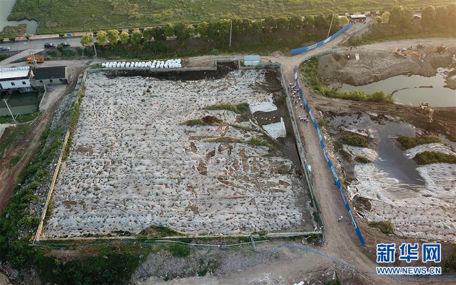 （新華視點(diǎn)&middot;圖文互動(dòng)）（1）中央督察兩年有的絲毫未改，有的不減反增&mdash;&mdash;江蘇泰興數(shù)萬噸化工廢料和污泥堆放長江邊調(diào)查