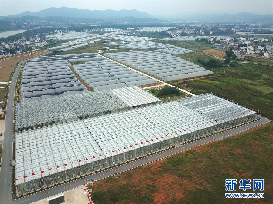 (新華全媒頭條·壯麗70年·奮斗新時代——記者再走長征路·圖文互動)(3)跨越“第一渡” 長征出發地“換了人間”