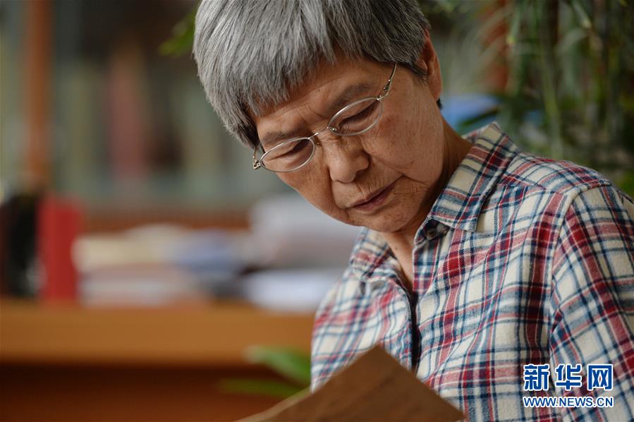 (時代先鋒·圖文互動)(6)此生不悔入沙海 勇擔重任始見金——敦煌研究院文物保護利用群體群像