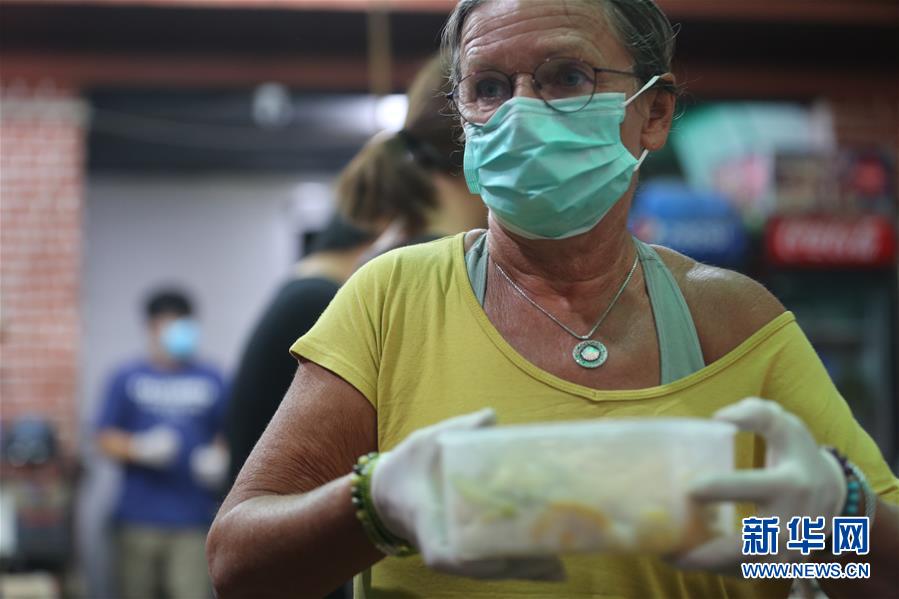 (國際疫情 ·圖文互動)(5)通訊:加德滿都中國人奉獻的“愛心便當”