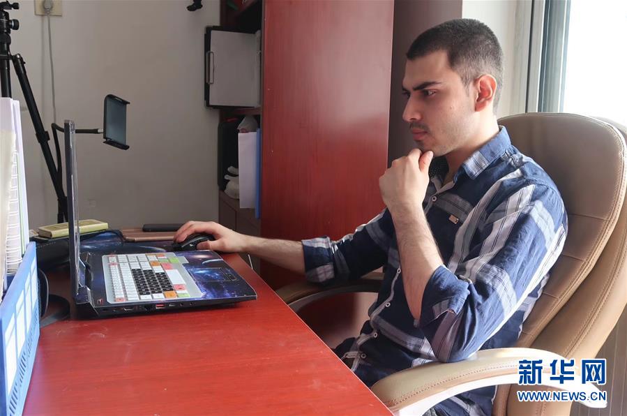 (抗疫中的真善美·圖文互動)(1)阿富汗留學生沙溢:我理解了制度優(yōu)勢的含義