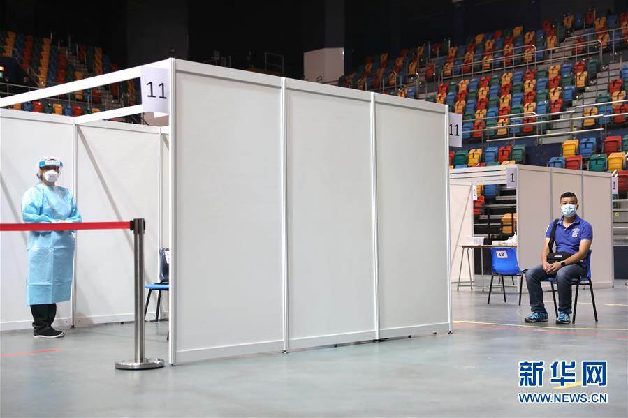 (圖文互動)(3)特寫:新冠病毒普檢首日,香港市民踴躍參與