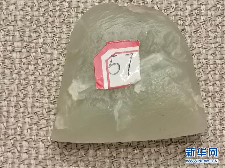 (文化視點(diǎn)·聽文物講故事·圖文互動)(1)豪橫!古人扛著玉斧在羅布泊打獵