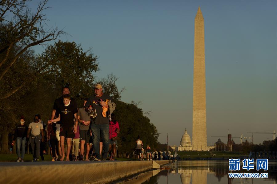 (國際疫情)(1)美國日增新冠確診病例超13萬 一周日均新增近10萬