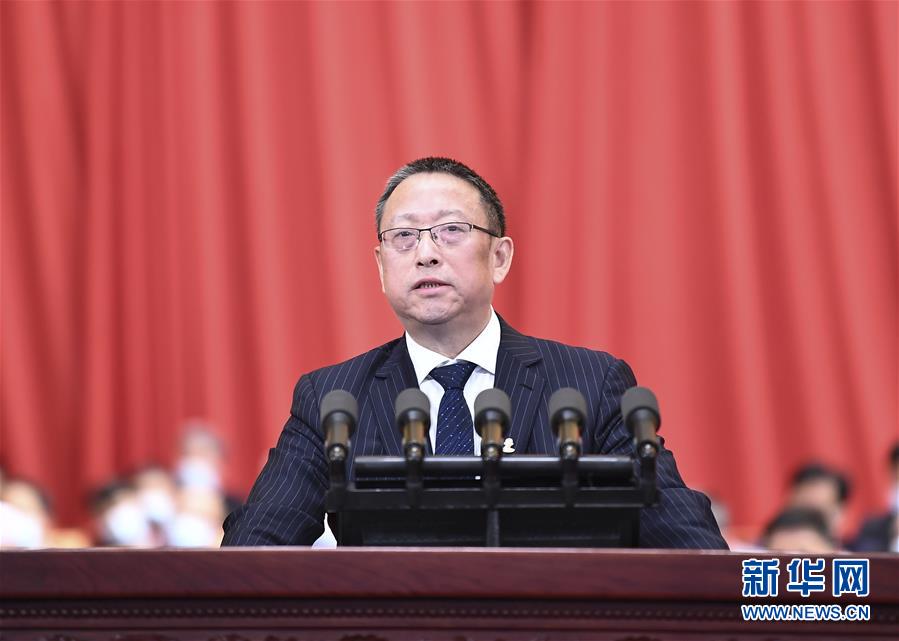 (兩會(huì)·政協(xié)開幕·XHDW)鄭建邦代表政協(xié)第十三屆全國委員會(huì)常務(wù)委員會(huì)作提案工作情況的報(bào)告