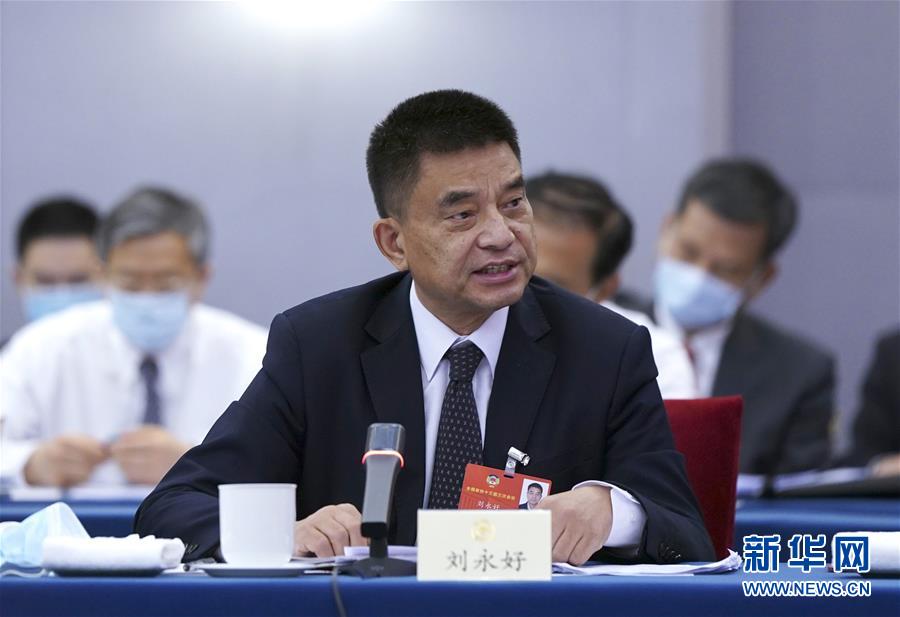 （兩會&middot;熱點畫報）（3）代表委員建言統(tǒng)籌做好經(jīng)濟社會發(fā)展工作