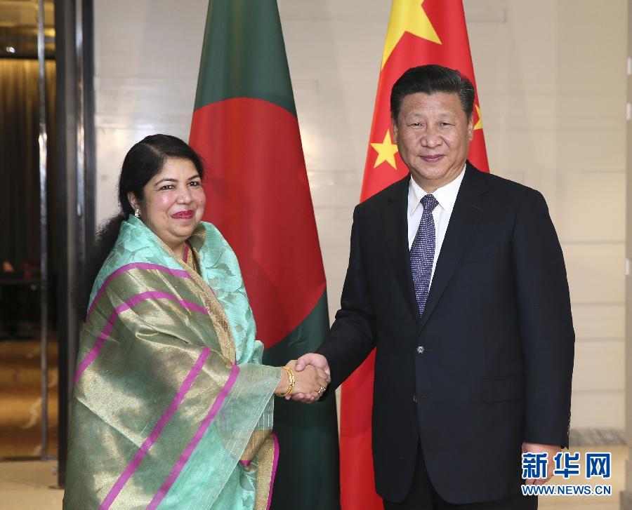10月14日，國家主席習(xí)近平在達(dá)卡會見孟加拉國國民議會議長喬杜里。 新華社記者蘭紅光攝 